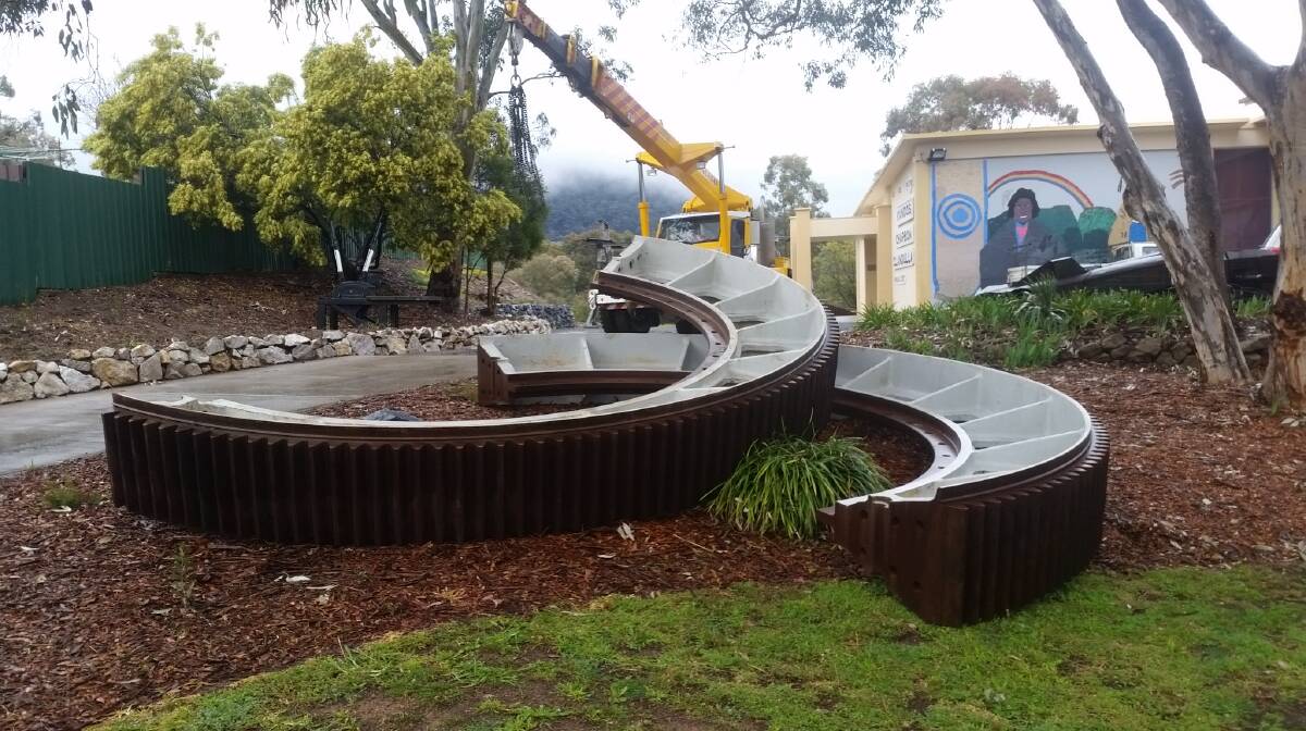 Looking Decorative: A work of art in their own right, the large girth gears from Cement Australia are now a feature of the Kandos Museum’s front garden.
