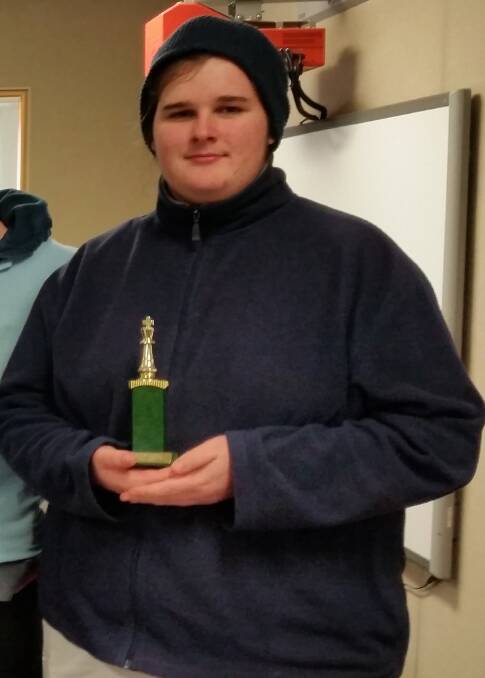 KHS Chess Team: Emerson Maunder, taking the title with an impressive score of 7.5/8. Mathew, Emerson and Niki once again made their assault.