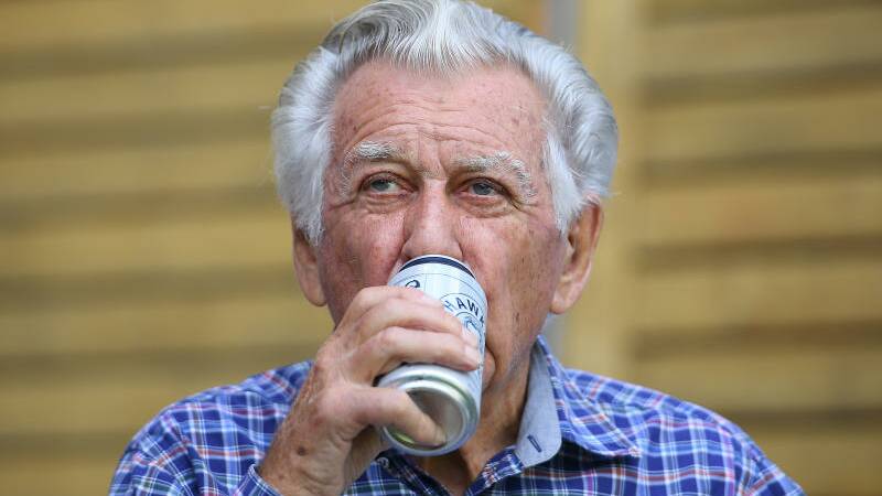 This former PM is pictured enjoying an aptly named beer.