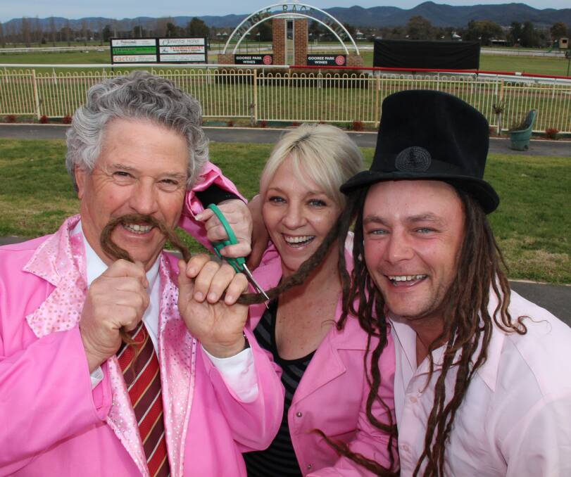 THE CHOP: Hugh Bateman with hairdresser Karla Richardson and David Walker whose dreadlocks will be cut to raise funds for cancer care. 