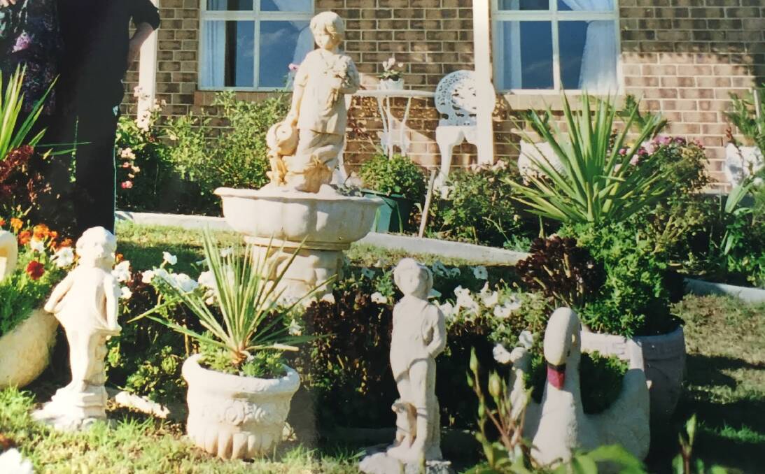 STOLEN: Thieves are believed to have stolen the knee high child and cherub figures from the Flirtation Avenue front garden during the early hours of Friday, July 22. 
