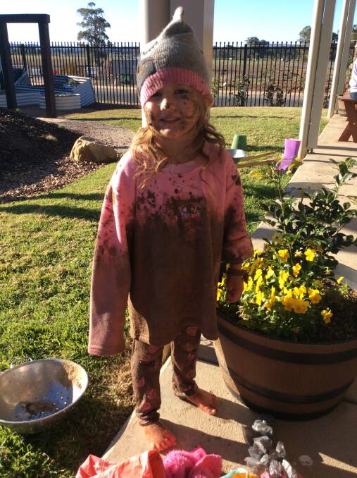 MUDDY FUN: Children at Lady Gowrie Mudgee got their hands dirty on Wednesday for International Mud Day. 