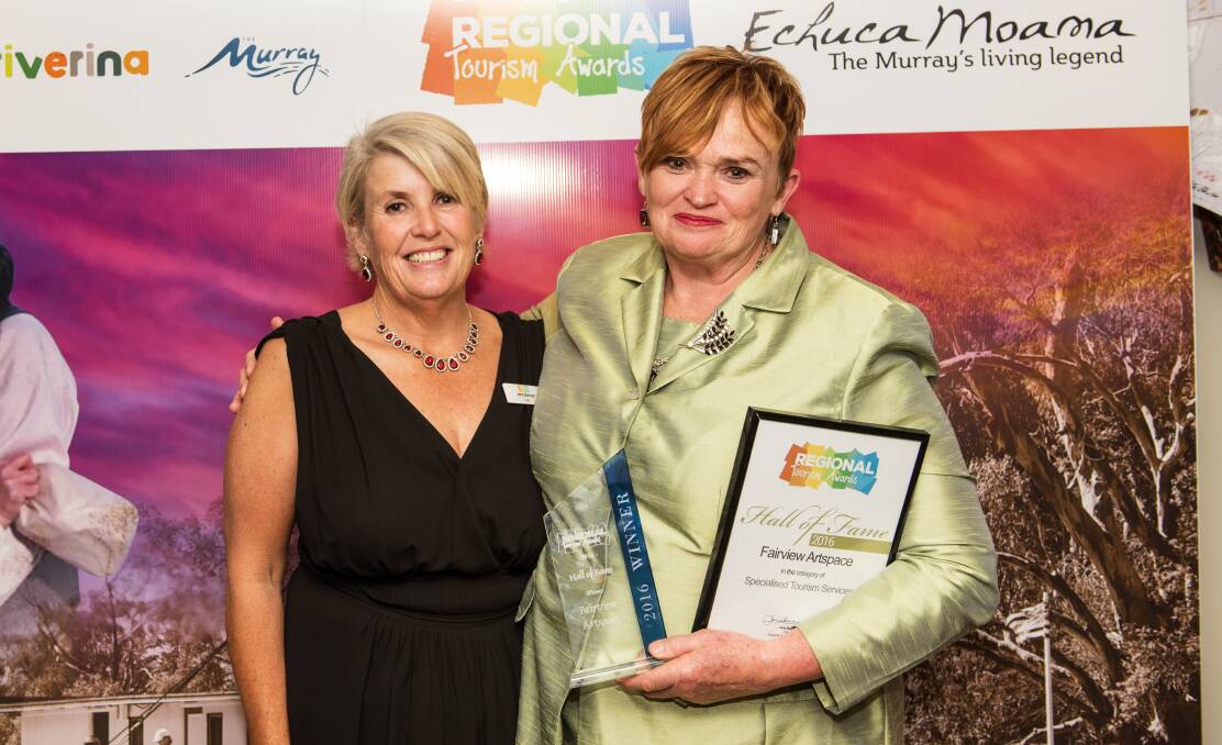 TOURISM AWARDS: Chair of the Regional Tourism Awards Jane Barnes with Hall of Fame Inductee Helen Harwood from Fairview Artspace. Photo: The Art of Zowie Photography.
