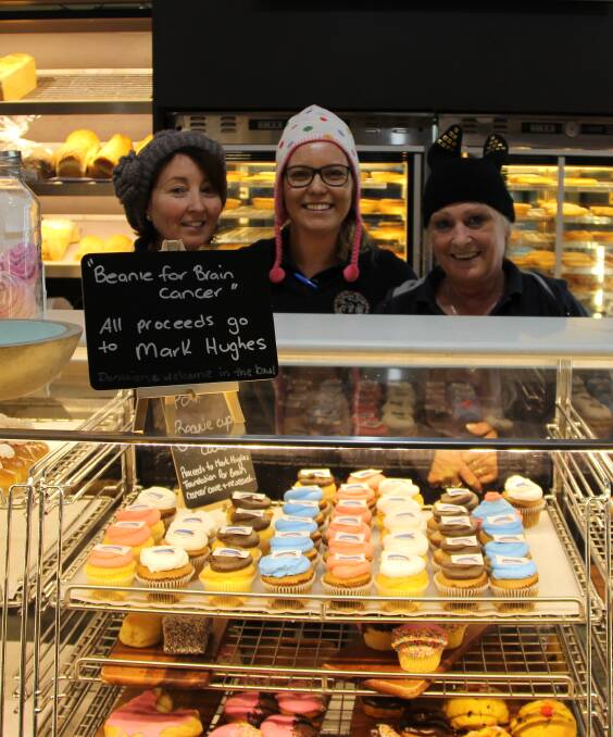 FOR A GOOD CAUSE: Annie Clarke, Cassandra McDonald and Judy Gibbons from Mudgee Bakery wearing their Beanies for Brain Cancer awareness week. 