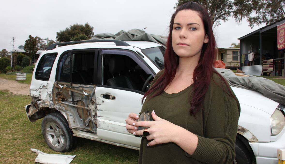 LUCKY ESCAPE: Elle Brydon walked away with just cuts and bruises after a 4WD side-swiped her car on the Castlereagh Highway last week. 