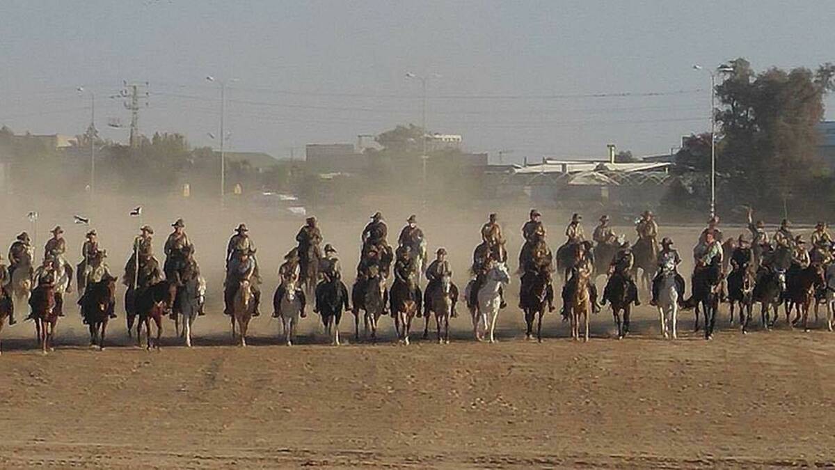 Walk for peace: A section of the Australian Light Horse Association re-enactment of the history-making charge at Beersheba. Picture: Orit Crombie.