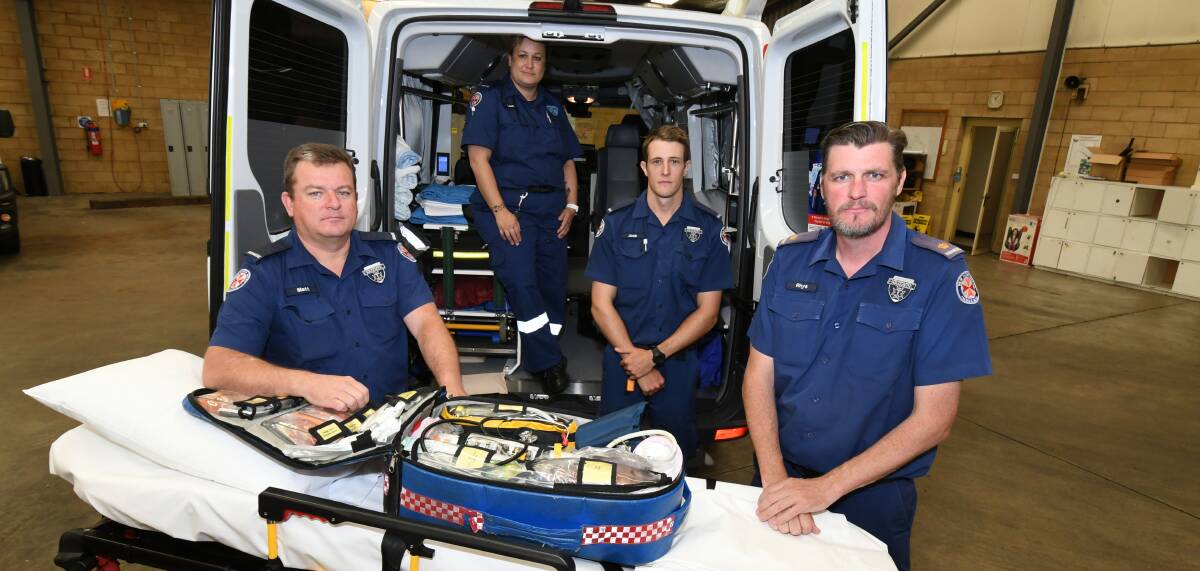 ON CALL: NSW Ambulance paramedics Matt Tucker, Leah Butcher, Jock Cartwright and Inspector Rhys Dive. Photo: JUDE KEOGH 1312jkambos1