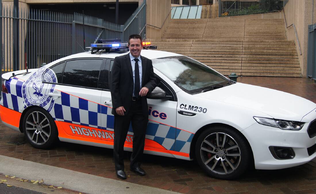 Patrol:  Member for Bathurst Paul Toole with one of the new highway patrol cars which will be used in crash hotspots across NSW. 