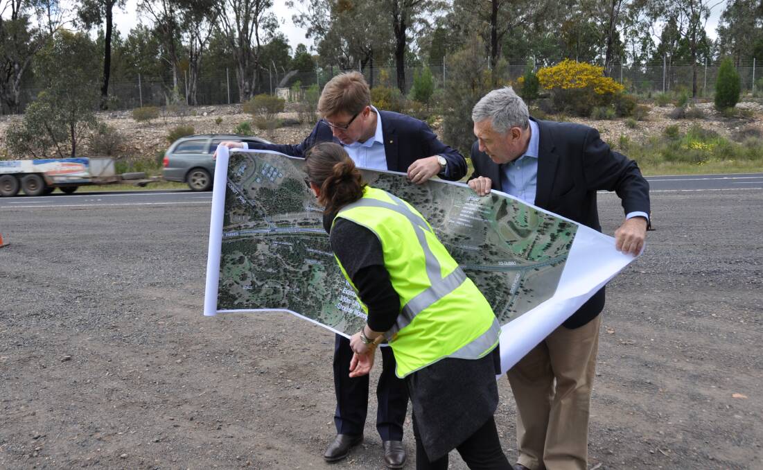 Roadworks ahead: Troy Grant MP, with Roads Minister Duncan Gay and an RMS representative discuss the upgrade to Blackbutt Road

