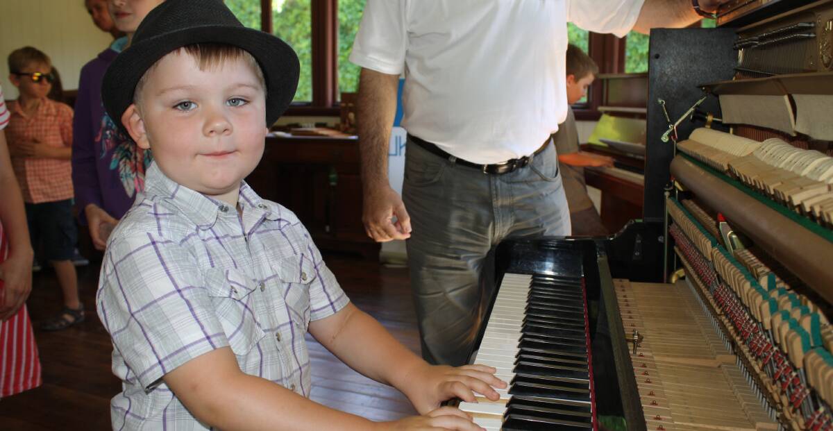Young music enthusiast Chase Oakhill was excited about the chance to try the piano. 