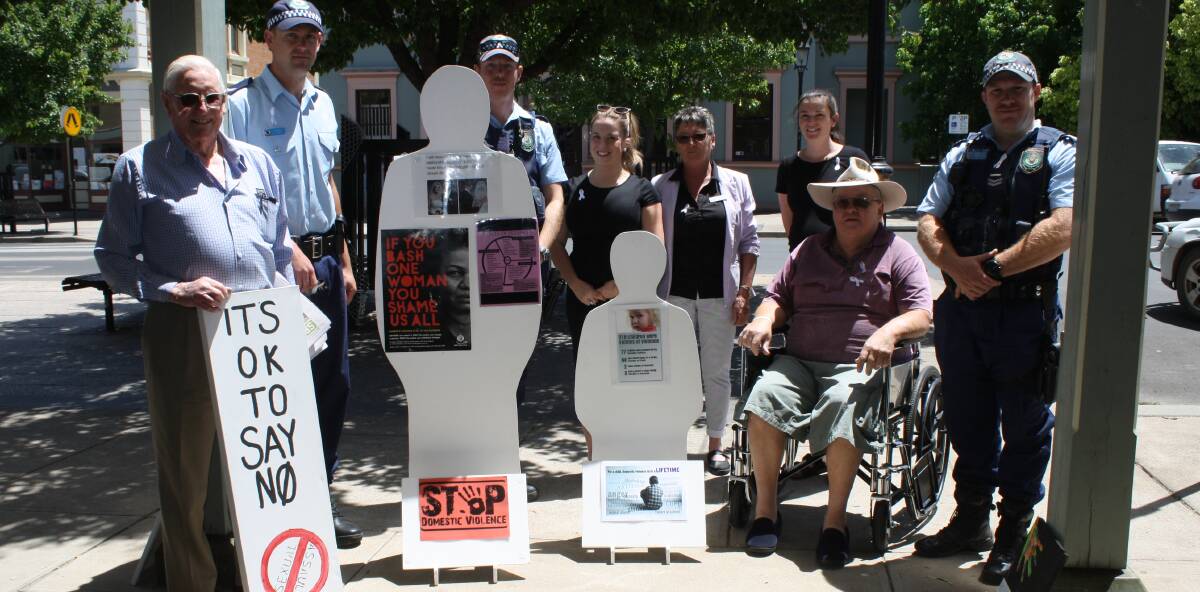 Bob Stanley (Mudgee Rotary), Mudgee Police domestic violence liaison officer Sr Constable James Ray, Sr  Constable A.J. Tull,  Nicole Williams of Barnardos Mudgee, Marisa Quintana of People Against Violence, Morgan O’Reilly of Women Health and Community Health, Ken Reynolds and Sr Constable Troy Skinner at the White Ribbon display in Market Street