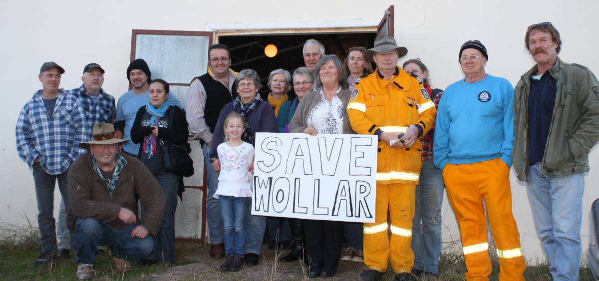 Gutted:  Bev Smiles (centre), protesting with Wollar residents in 2015, says she is "gutted" by the recommended approval of the Wilpinjong extension. 
