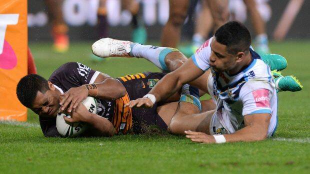 Points avalanche: Jarryd Hayne can't stop Anthony Milford scoring. Photo: Getty Images