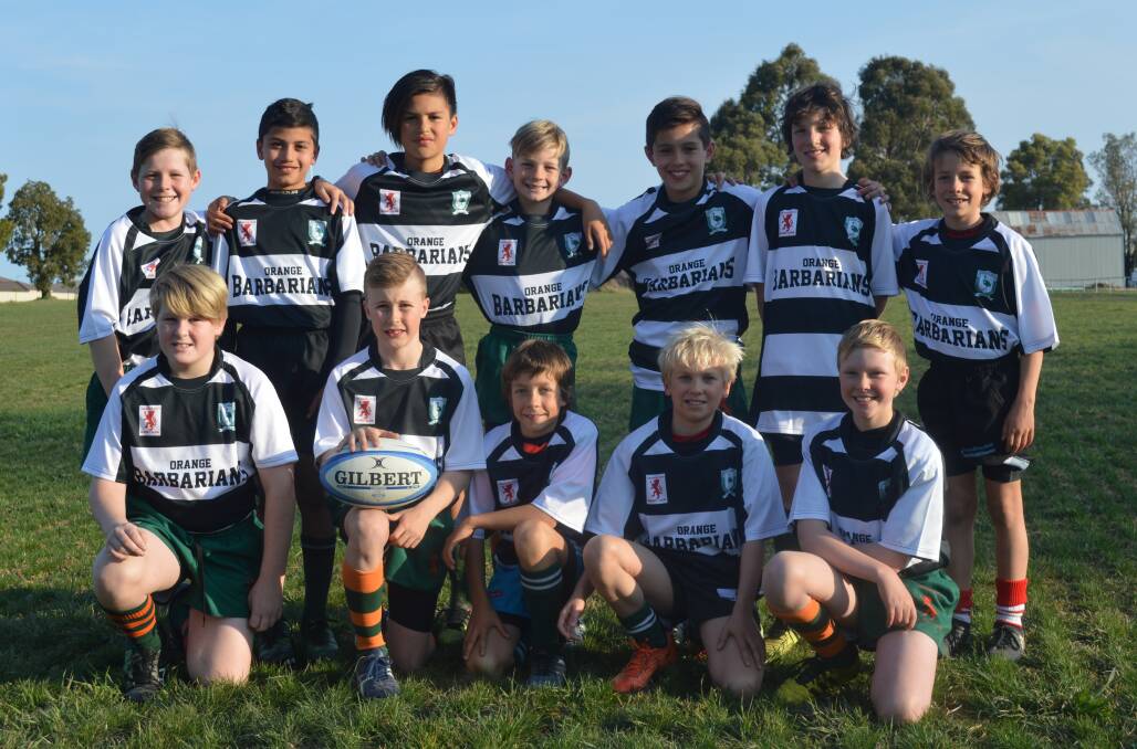 JOINING FORCES: Six youngsters from Orange Emus and six from Orange City have combined for this weekend's Parkes junior sevens tournament. Photo: MATT FINDLAY