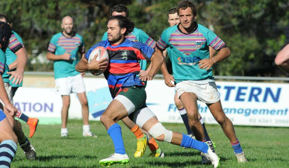 IN MEMORY OF: Terry Brown makes a break for Jack Blunt Legends in the 2015 tournament. The side playing in memory of the gifted playmaker will be tough to beat at this year's Royal Hotel Invitational 10s. Photo: JUDE KEOGH