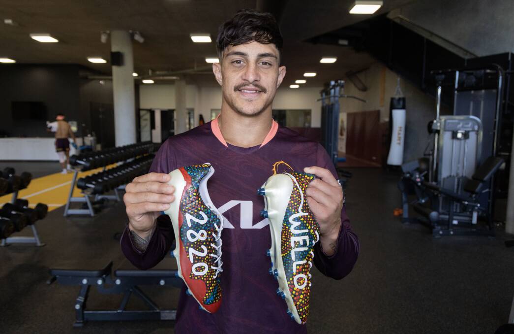 Kotoni Staggs with specially designed Wellington-themed boots ahead of the NRL's 2023 Indigenous Round. Picture by Brisbane Broncos
