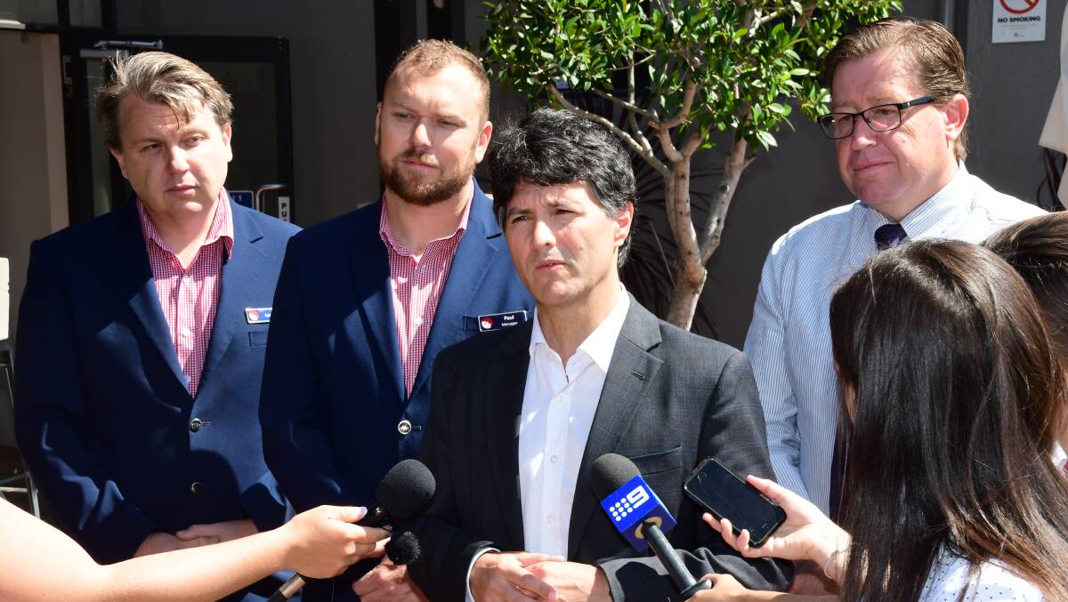 Finance Minister Victor Dominello, with Service NSW representatives Lachlan Meurer and Paul Sutton, and Dubbo MP Troy Grant, says CTP reforms will save motorists an average of $70 a year.