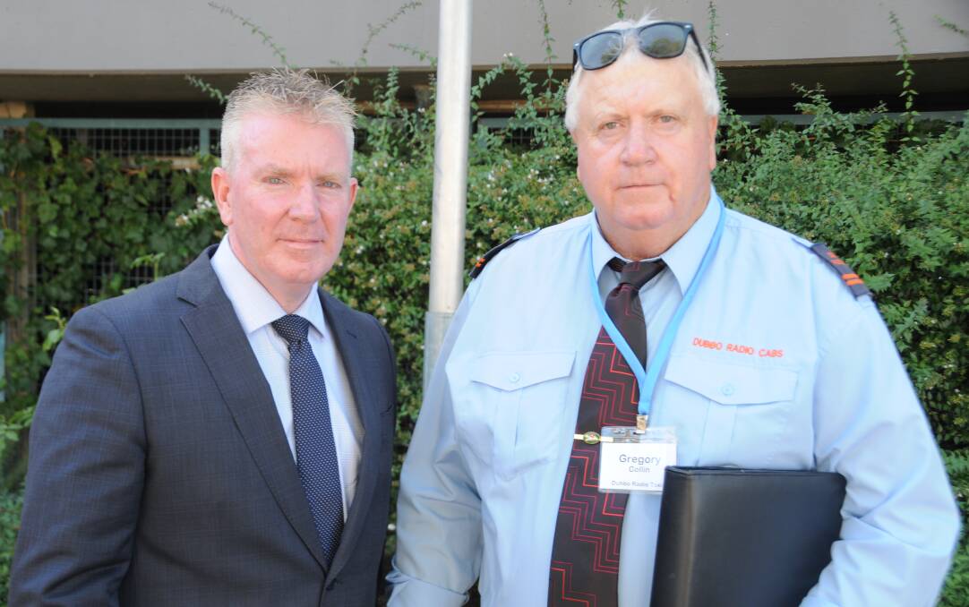 Not happy: NSW Taxi council president Martin Rogers and Dubbo taxi operator Greg Collin outside the IPART hearing.