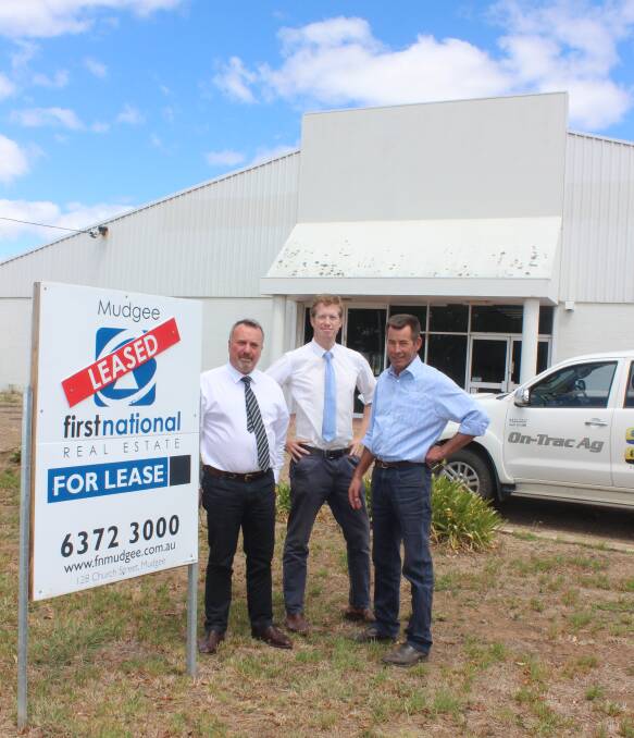 LEASED: Real estate agent Bob Proestos, Business development manager Tim Stratton and On-Trac Ag Director Warwick Westcott.