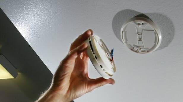 Test smoke alarms regularly and change the battery at least once every 12 months.