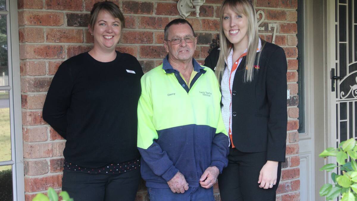 Garry Stanford with Westfund Regional Manager Sarah Willoughby and Sales Consultant Bianca Maloney. Photo: supplied
