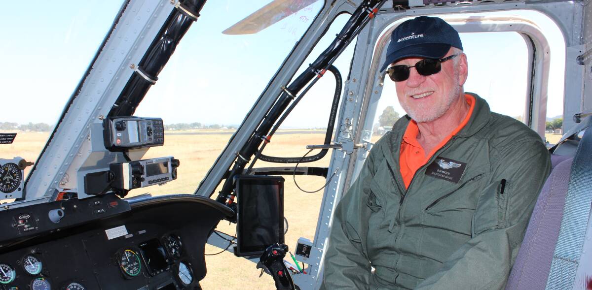 CREW: Pilot Don McLeod in the cabin of the Erickson Skycrane.