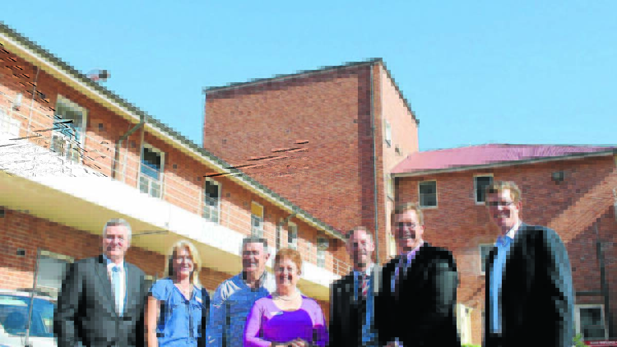 The Coalition Government announced that it would invest $60 million to upgrade the Mudgee Hospital if re-elected in 2015. Pictured (from left) are Mid-Western Regional Council General Manager Brad Cam, General manager Southern Sector Western NSW Local Health District Sharon McKay, Mid-Western Region Council Mayor Des Kennedy, Mudgee/Gulgong Health Services Manager Judith Ford, Western NSW Local Health District chief executive Scott McLachlan, Deputy Premier and Member for Dubbo Troy Grant, and Member for Orange Andrew Gee at the Mudgee Hospital.