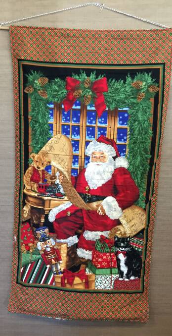 Father Christmas wall hanging by Mary Mogg. Photo: supplied