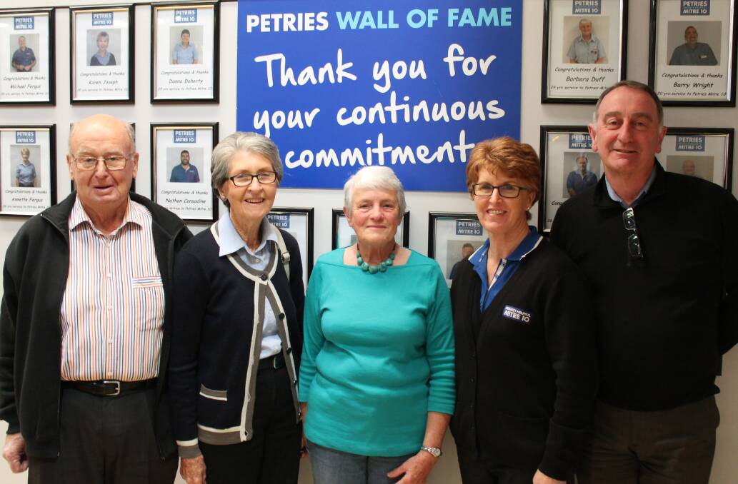 THANKS: Barbara is thanked for her three decades with the local Petries Mitre 10 store by Mal and Carmel Petrie, and Annette and Mike Fergus. 