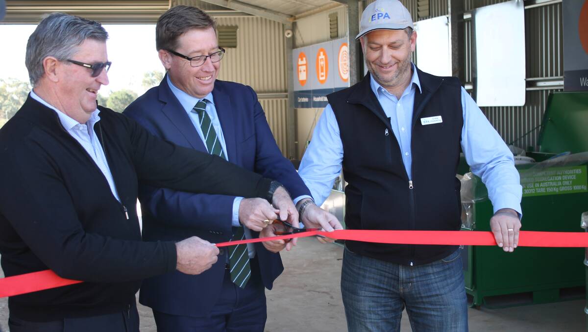 MAKING THE CUT: Mayor Des Kennedy, state member Troy Grant and Craig Flemming of EPA, officially open the Mid-Western Community Recycling Centre.