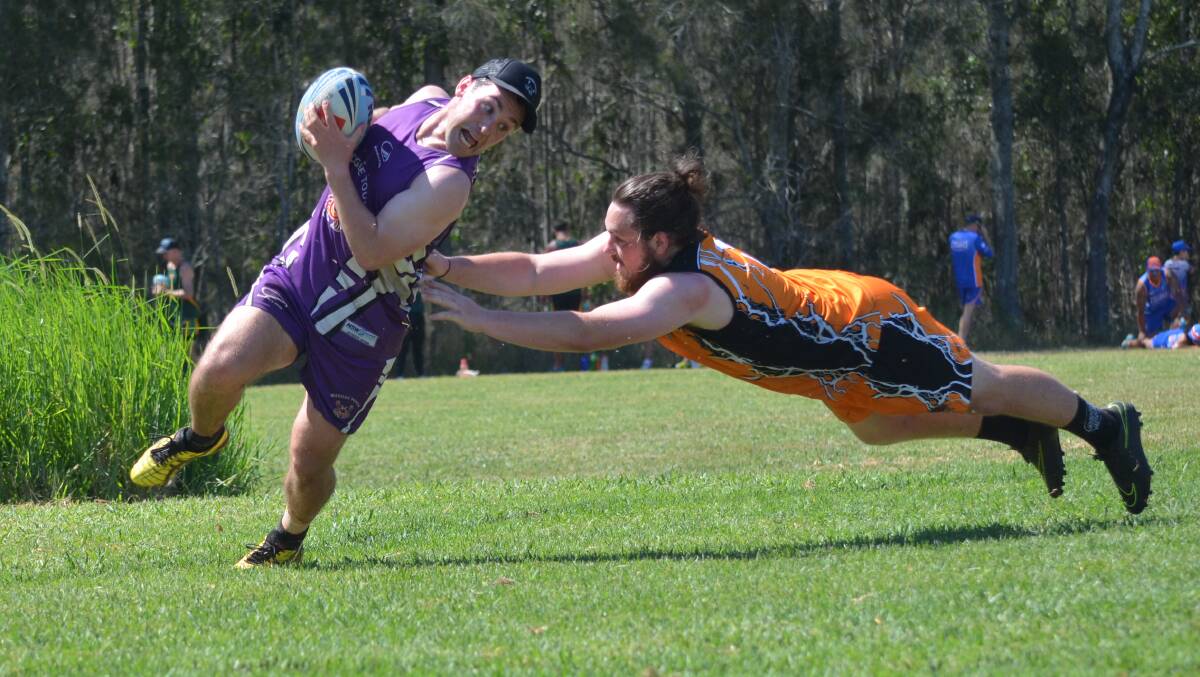 CAUGHT: Mudgee's Andrew Laurie is nabbed at the NSW State Cup on the weekend. Photo: Ben Harris.