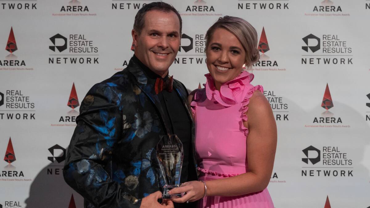  Alyse accepting her award from ARERA's Michael Sheargold.