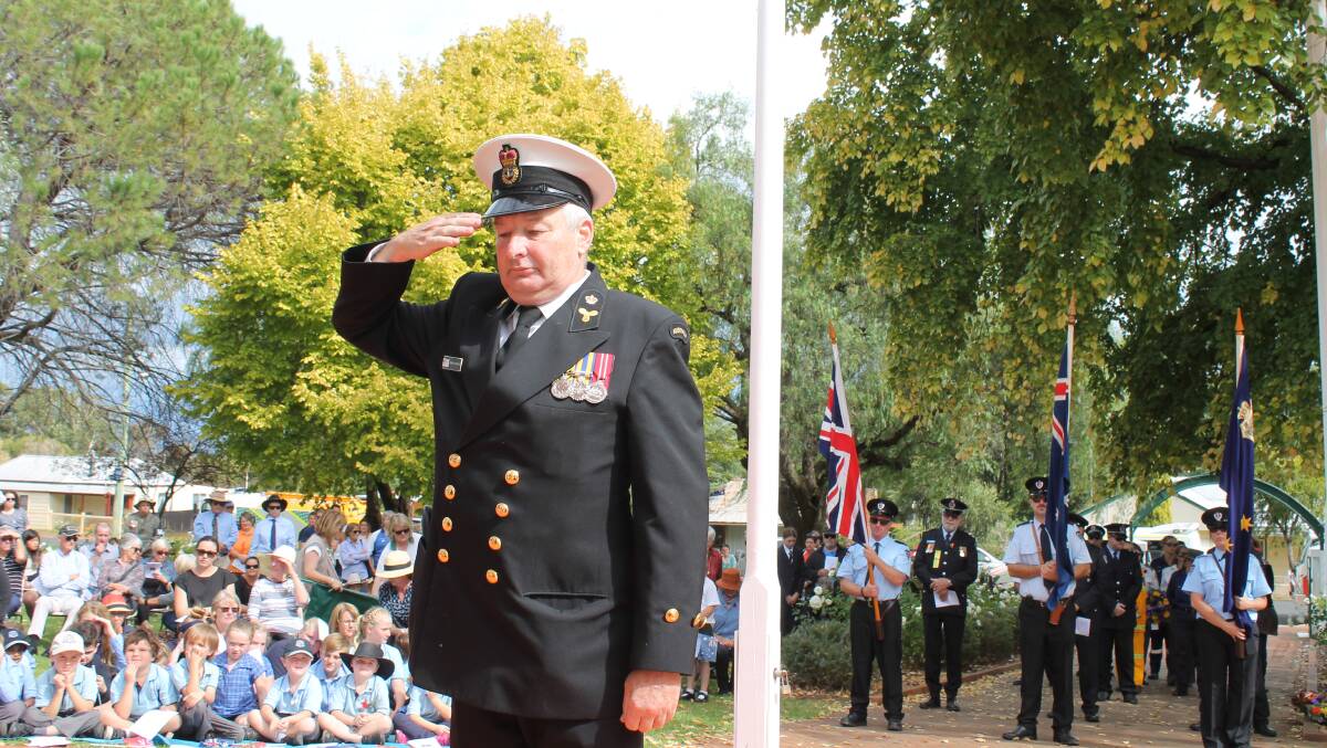 SALUTE: Greg Dunnicliff laid the wreath for the Australian Merchant Navy at the Gulgong Anzac commemoration.