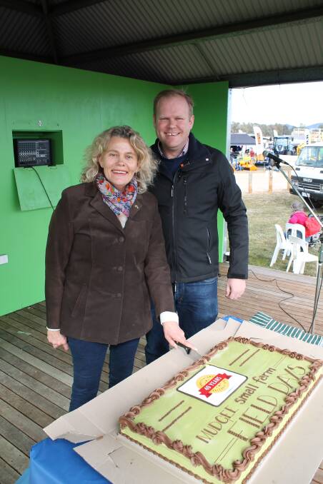 President of National Farmers Federation Fiona Simson and AREC chairman James Sutherland cut the cake at the official opening.