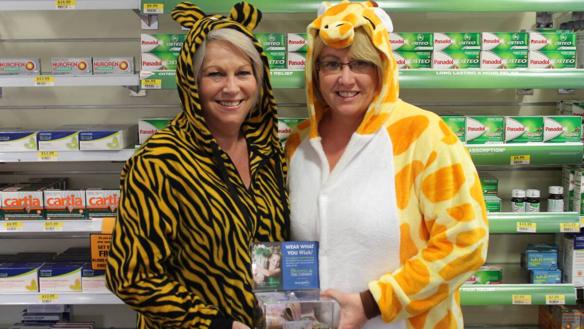 COLOURFUL CHARACTERS: Debra Brown and Brooke Ward at Blooms the Chemist Mudgee Southside support Make-A-Wish Foundation’s ‘Wish Force’ on Friday.