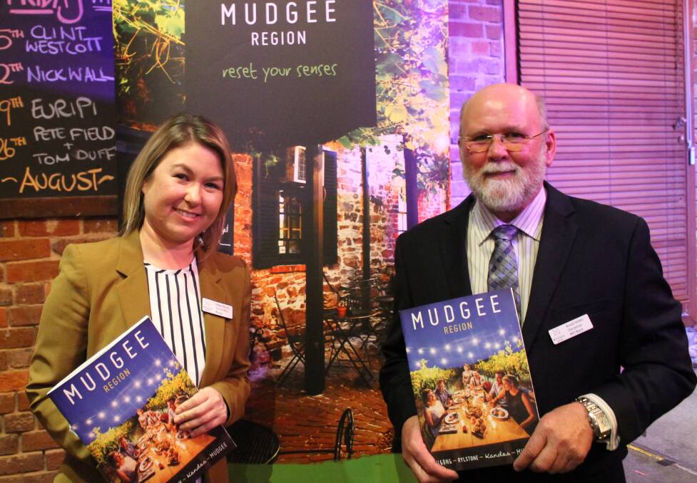 LAUNCH: Mudgee Region Tourism acting CEO Leianne Murphy and chairman Russell Holden at the launch of the new destination visitor guide for the region.