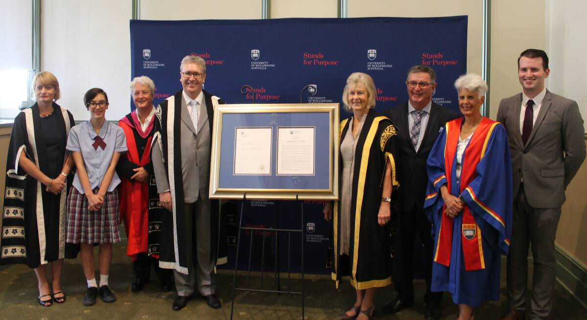 DOCTORS' ORDERS: The University of Wollongong presented their Community Fellowship Award to the local region on Friday.