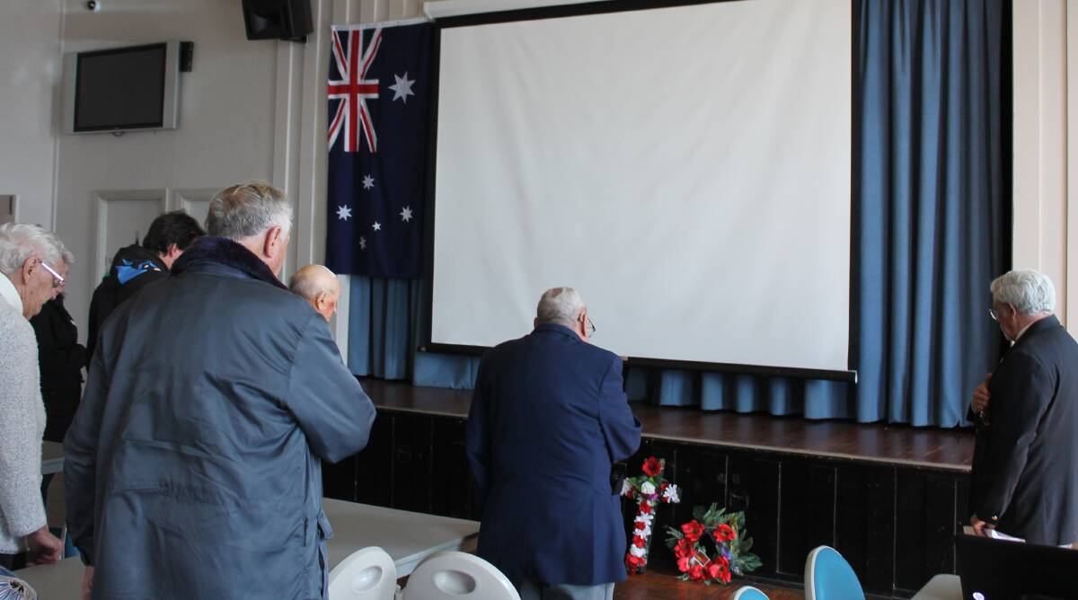 PAUSE: The Gulgong RSL Sub-Branch held a memorial service at the RSL Club on Friday to commemorate Veterans' Day.