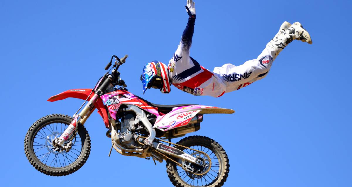 UP AND AWAY: Mudgee's Steve Mini is gearing up for a big few months including Nitro Circus in Dubbo, he is pictured getting in practice on his October pink bike. Photo: Col Boyd.