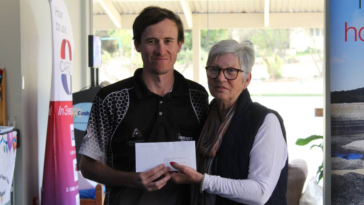 Wenty Leagues' Chris Couchman skip of the second placed team, pictured with Colleen Ryan of the Gulgong Bowling Club.