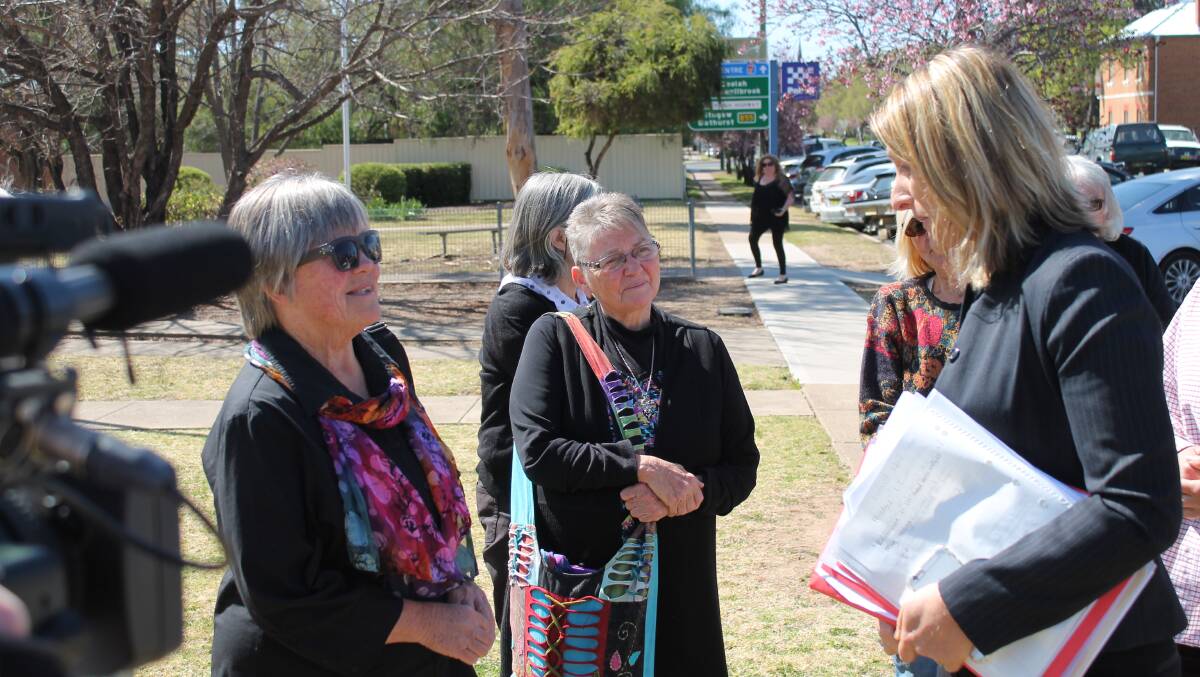 Bev Smiles (left) and chief executive of the Environmental Defenders Office Sue Higginson, outside Mudgee Local Court.