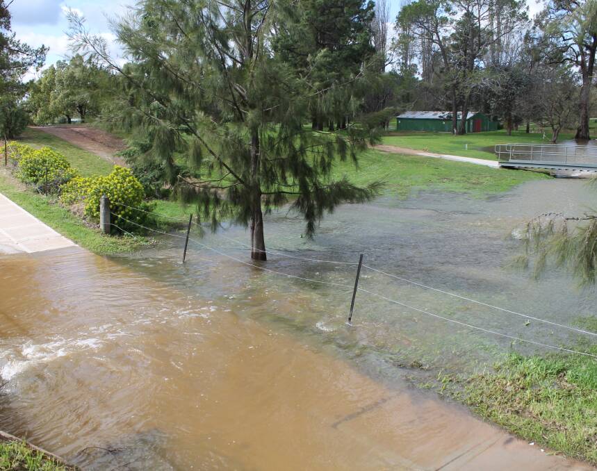 WATER COURSE: The record September rainfall in Mudgee - at 172.4mm as of Thursday - is seen in Redbank Creek's path through the Golf Course.  