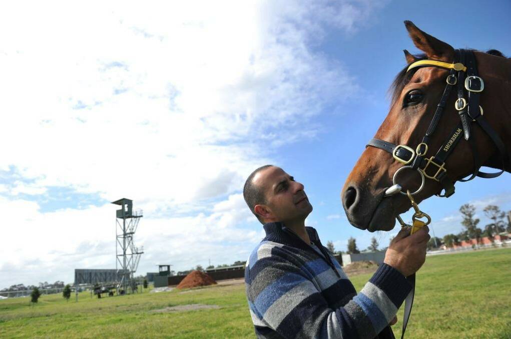 Trainer Saab Hasan with racehorse Shoreham.  Photo: Joe Armao