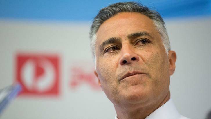 Australia Post chief Ahmed Fahour  announces the half-year result of $197 million profit.  Photo: Stefan Postles