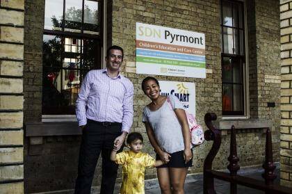 Lucky: Brian and Bootz Whyte, whose two-year-old daughter, Harper, attends SDN Pyrmont. Photo: Peter Braig
