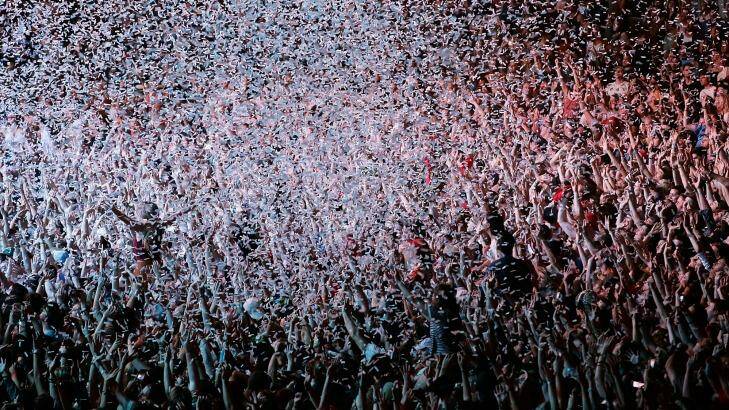 Fans are showered in confetti during the Gang Of Youths performance during Splendour in the Grass.