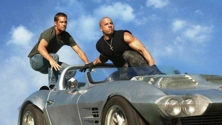Paul Walker and Vin Diesel in <i>Fast and Furious 7</i>.
