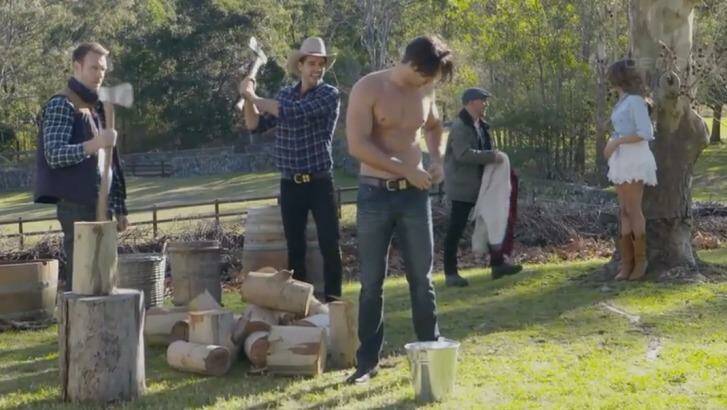 Tension reached boiling point during the wood chopping scene when Rhys stepped up their model-off by whipping off his flannel shirt. Photo: Channel Ten