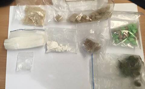 Police have allegedly found a large quantity of drugs including cocaine, cannabis and MDMA in a car near Coonabarabran.
