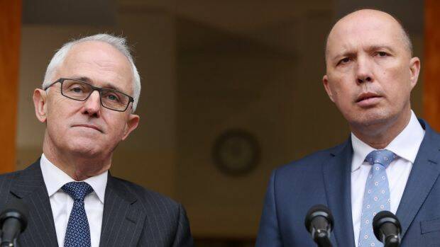 Not an admission of liability: Prime Minister Malcolm Turnbull and Immigration Minister Peter Dutton. Photo: Andrew Meares
